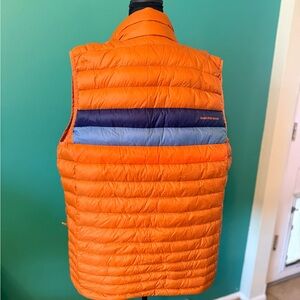 Cotopaxi Vibrant Orange Vest with Blue Stripes